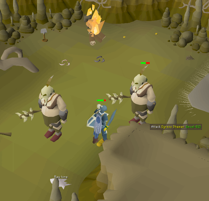 killing ogre shamans, fire and raw tuna on the ground.webp